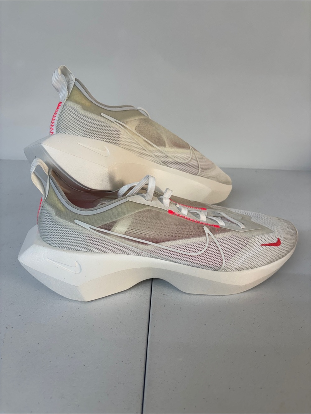 Nike Women's White and Pink Streamlined Running Sneakers